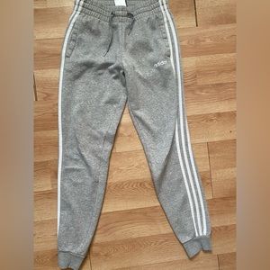 Woman’s Adidas grey striped jogget sweatpants